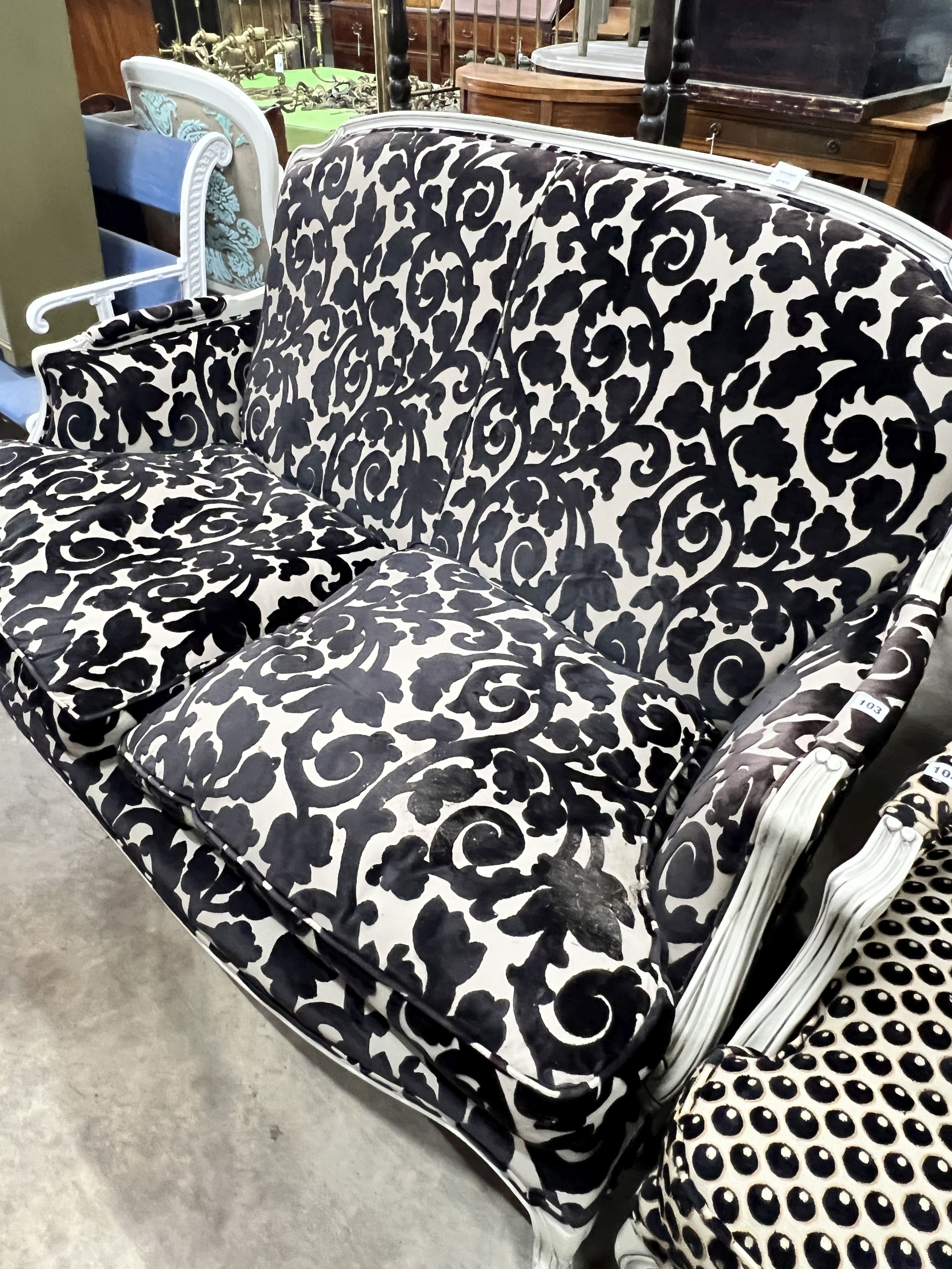 A French style painted upholstered settee, length 150cm, depth 80cm, height 90cm